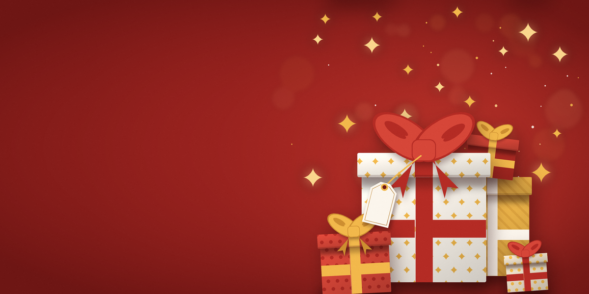 Wrapped Christmas gifts with a blank gift tag on a warm red background